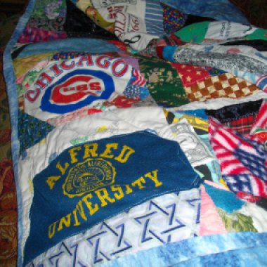 A Cubs worn out sweatshirt recycled into a quilt